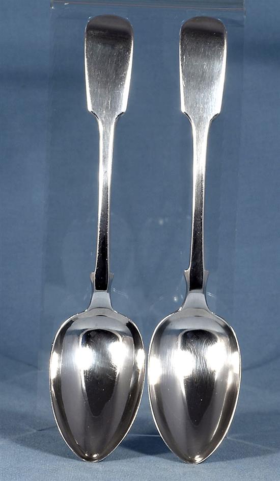 A pair of William IV silver fiddle pattern serving spoons and a similar Victorian pair, Length 237mm, weight 4.9oz/153grms